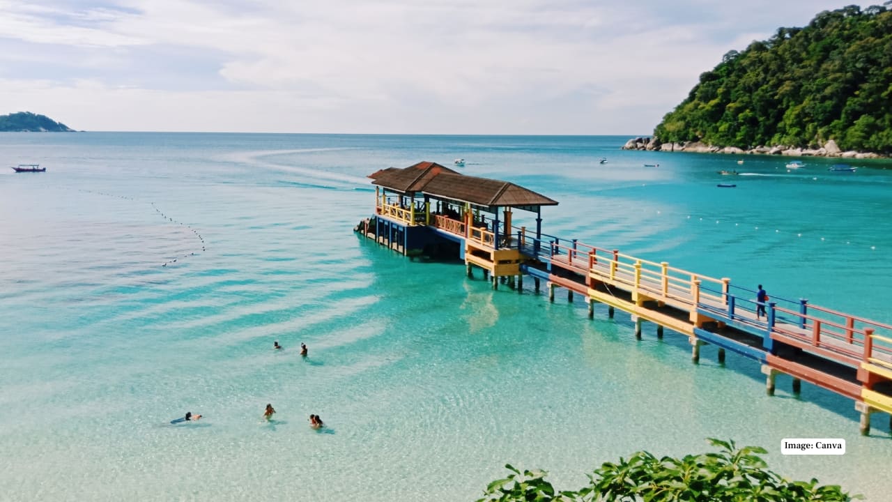 5. Perhentian Islands, Malaysia The Perhentians are idyllic islands featuring crystal-clear waters, vibrant coral reefs, and abundant marine life. Ideal for snorkeling and eco-conscious travelers, the islands offer peaceful jungle trails, quiet beaches, and unforgettable encounters with turtles, fish, and other sea creatures. (Image: Canva)