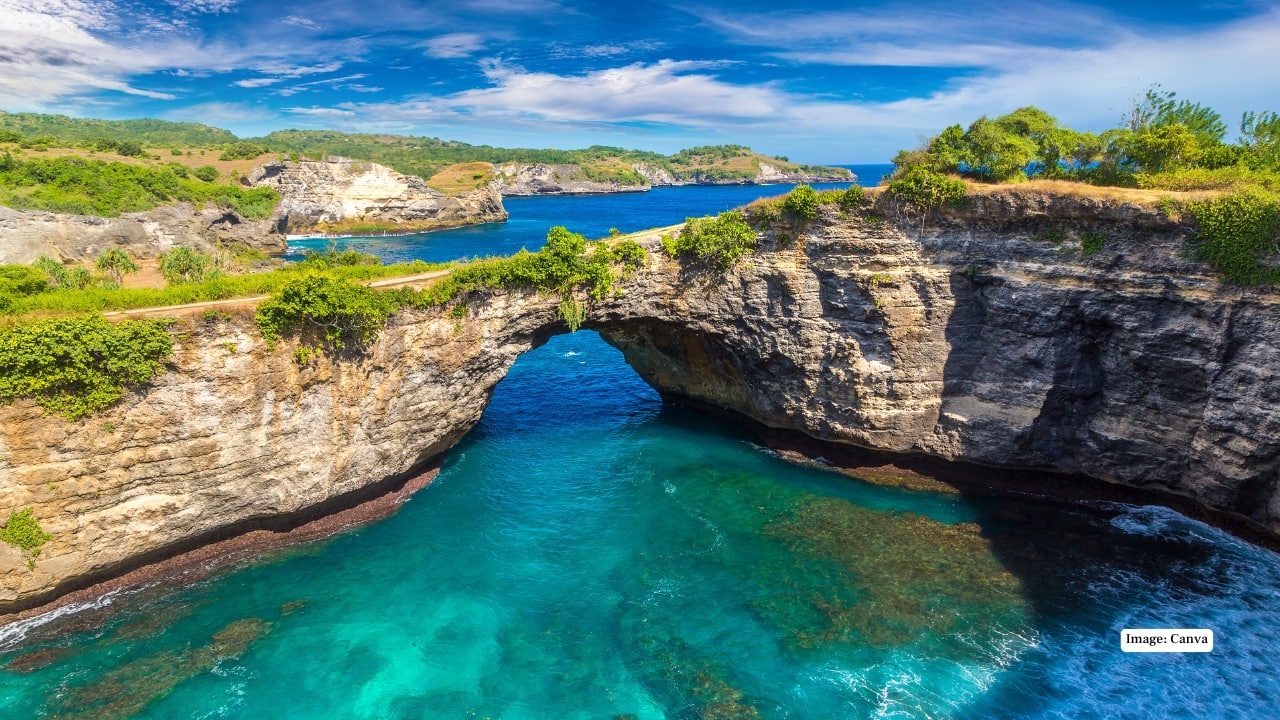 7. Nusa Penida, Bali, Indonesia While Nusa Penida has grown in popularity as a must-visit day trip from Bali, it still captivates with dramatic cliffs, hidden coves, and vibrant marine life. Adventurers can snorkel alongside manta rays, hike rugged trails, and discover quieter beaches tucked away from the crowds, offering a thrilling yet intimate escape just a short boat ride from Bali’s bustling tourist hubs. (Image: Canva)