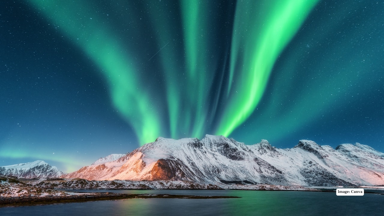 3. Lofoten Islands, Norway – Rugged Beauty Meets Aurora The jagged peaks and icy waters of the Lofoten Islands create a dramatic backdrop for the northern lights. Add wildlife spotting, quaint fishing villages, and epic winter photography, and you have a destination that’s as adventurous as it is breathtaking. (Image: Canva)
