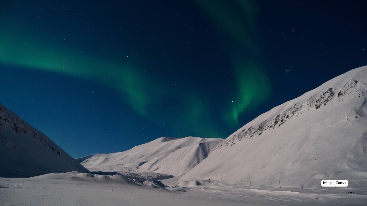 5. Svalbard, Norway – The Ultimate Arctic Adventure For those seeking remote wilderness, Svalbard is unmatched. Vast glaciers, polar bears, and the aurora in its purest form make this Arctic archipelago a bucket-list experience. It’s the perfect mix of thrill, solitude, and magic. (Image: Canva)