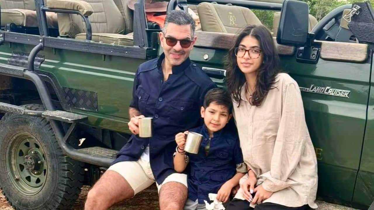 Sunjay Kapur is seen here enjoying a relaxed safari moment with his children, Samaira and Azarias. With mugs in hand and smiles all around, the picture captures a joyful memory of togetherness in nature. Sunjay Kapur is seen here enjoying a relaxed safari moment with his children, Samaira and Azarias. With mugs in hand and smiles all around, the picture captures a joyful memory of togetherness in nature.