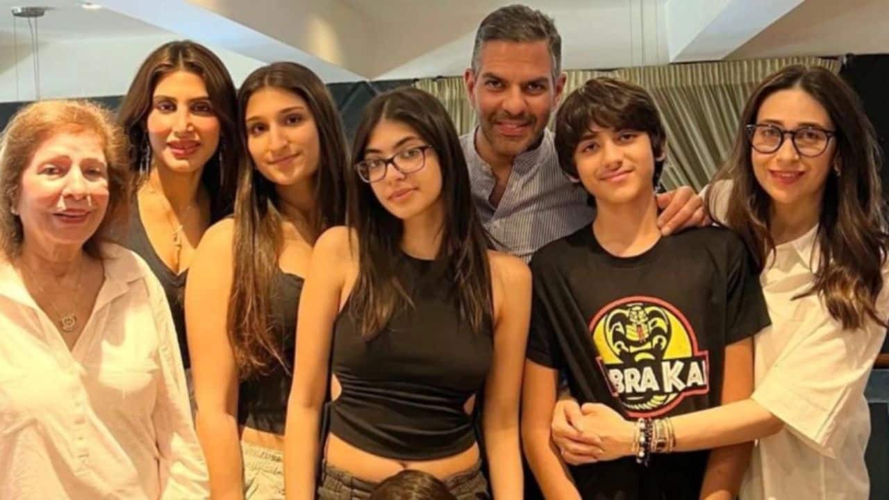 Sunjay Kapoor is seen here surrounded by his extended family, including ex-wife Karisma Kapoor, current wife Priya Sachdev, and all their children. The photograph beautifully reflects love, acceptance, and the shared bond of family. Sunjay Kapoor is seen here surrounded by his extended family, including ex-wife Karisma Kapoor, current wife Priya Sachdev, and all their children. The photograph beautifully reflects love, acceptance, and the shared bond of family.