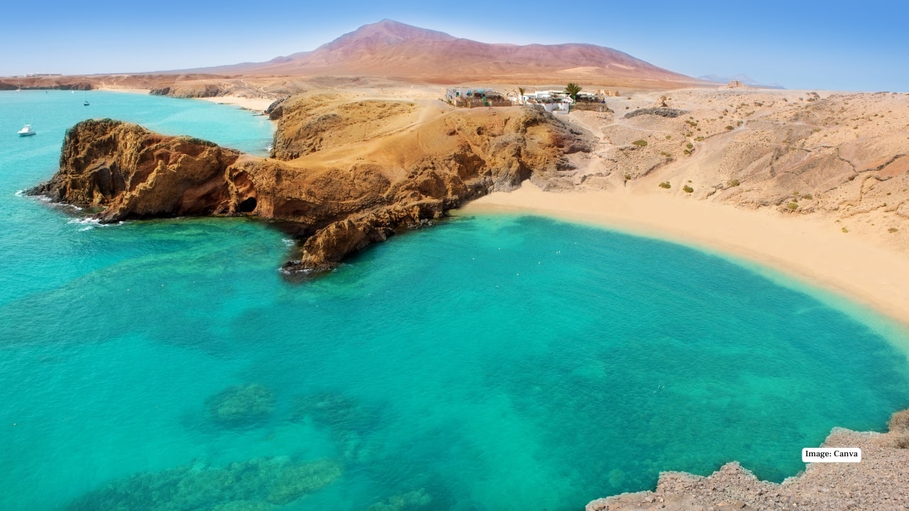 4. Lanzarote, Spain Dubbed the “island of a thousand volcanoes,” Lanzarote is a haven for nature lovers and serenity seekers. Discover Timanfaya National Park’s volcanic landscapes, cactus gardens, and unspoiled beaches. Savor Canarian cuisine like papas arrugadas with mojo sauce, enjoy farm-to-table meals, and unwind in volcanic hot spring spas. Lanzarote’s eco-conscious approach enhances its calm and immersive atmosphere. (Image: Canva) 4. Lanzarote, Spain Dubbed the “island of a thousand volcanoes,” Lanzarote is a haven for nature lovers and serenity seekers. Discover Timanfaya National Park’s volcanic landscapes, cactus gardens, and unspoiled beaches. Savor Canarian cuisine like papas arrugadas with mojo sauce, enjoy farm-to-table meals, and unwind in volcanic hot spring spas. Lanzarote’s eco-conscious approach enhances its calm and immersive atmosphere. (Image: Canva)