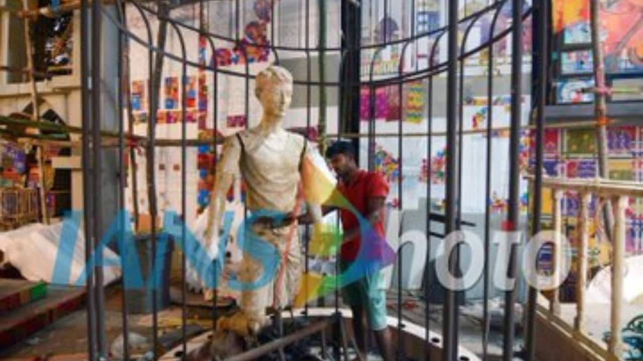 Artists give final touches to the idols of Goddess Durga at a community puja pandal in Kolkata, ahead of Durga puja festival. (@ians_india / X)