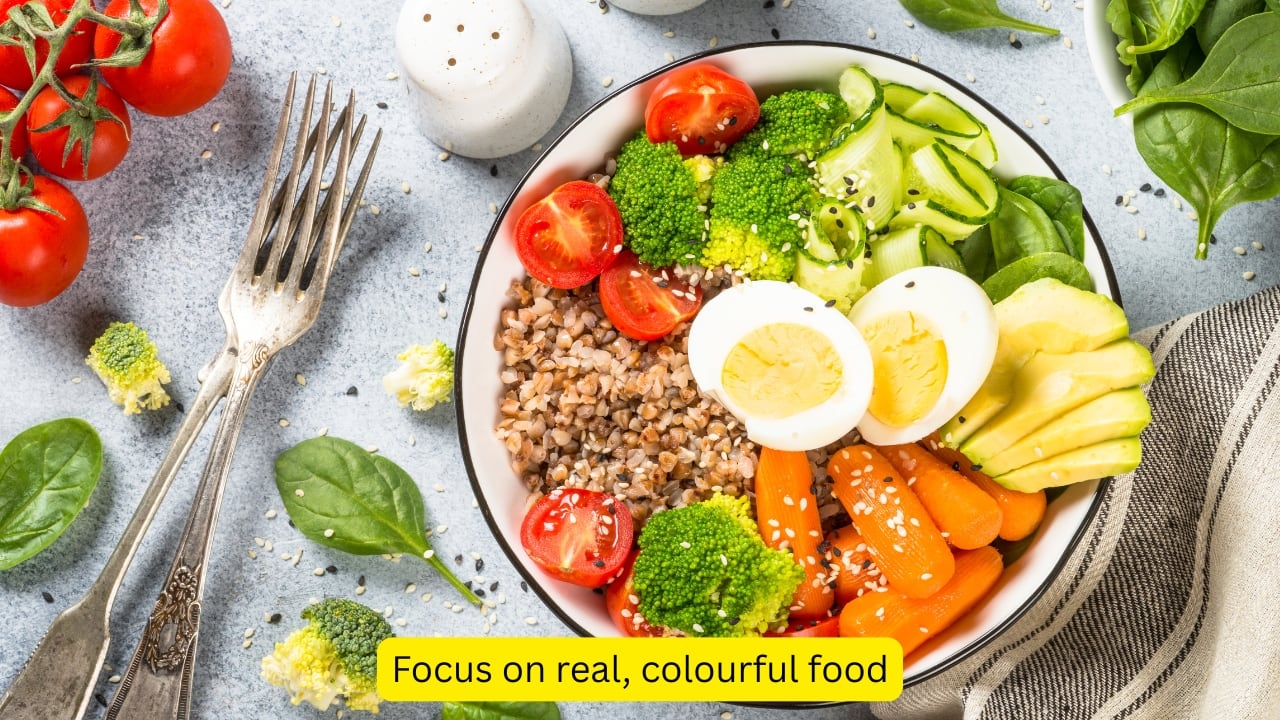 Focus on real, colourful food Fresh fruit, vegetables, whole grains, and lean protein can make a huge difference. Try to build meals from scratch when you can, and involve your child in the process of cooking. You can try to make healthy food fun, colourful and full of flavour — not just something to be forced. (Image: Canva)