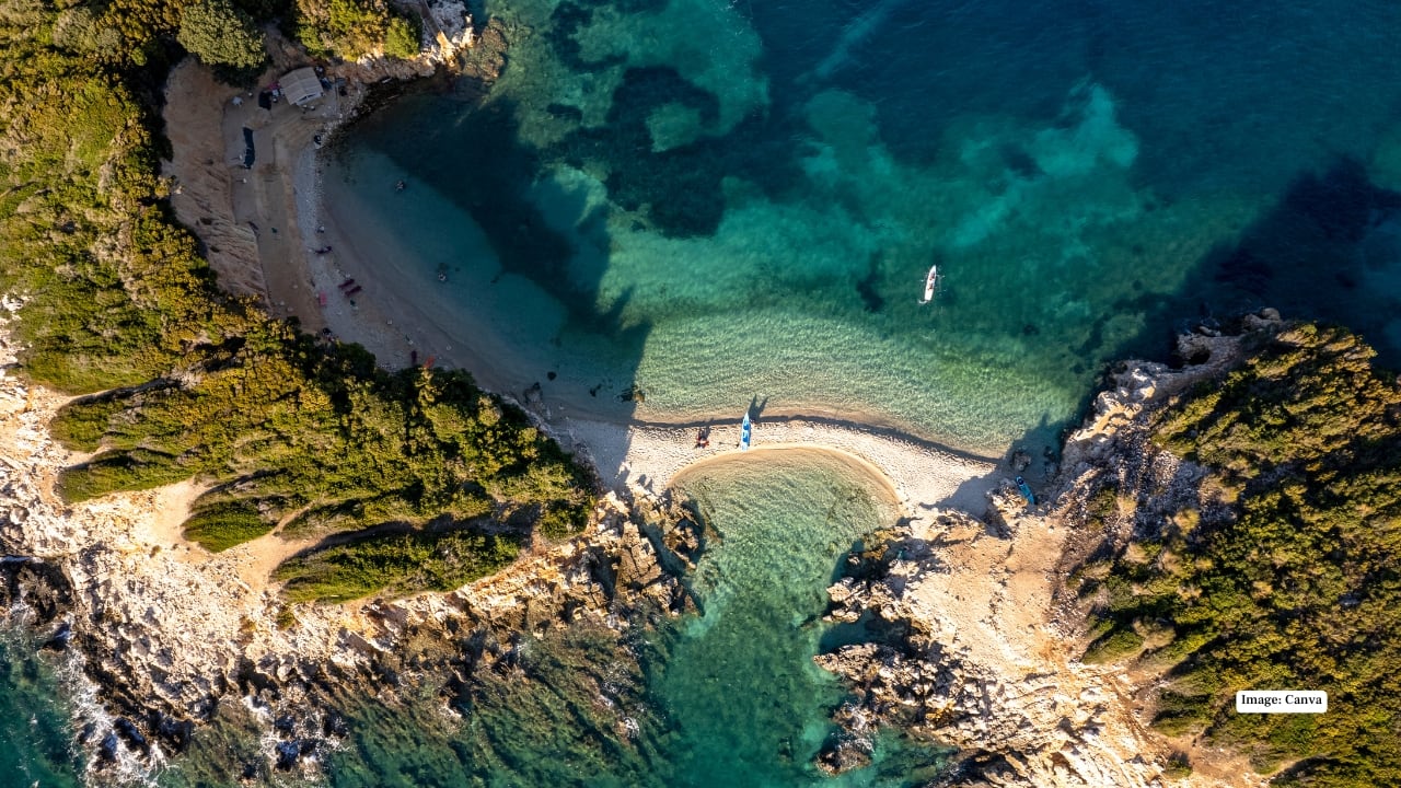 4. Albanian Riviera – Sun, Sea, and Serenity If turquoise waters and golden sands are calling, head to the Albanian Riviera. Hidden coves and charming villages like Dhërmi, Himara, and Ksamil offer the perfect blend of relaxation and adventure. Dive into crystal-clear seas, enjoy cliffside seafood, or simply lounge on beaches that feel untouched by time. Why You’ll Love It: Secluded beaches, vibrant seaside towns, and Mediterranean bliss without the crowds. (Image: Canva)