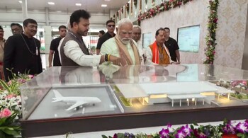 Prime Minister Narendra Modi with Union Minister of Civil Aviation Rammohan Naidu, Bihar Chief Minister Nitish Kumar and Deputy Chief Minister Vijay Kumar Sinha during the inauguration of the new terminal building of Purnea Airport, in Bihar. (PMO via PTI Photo)