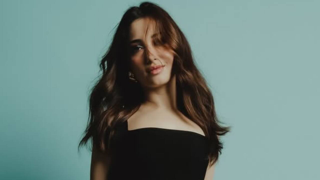 Bold colors black and white in bodycon silhouettes bring out her confident, glamorous side.