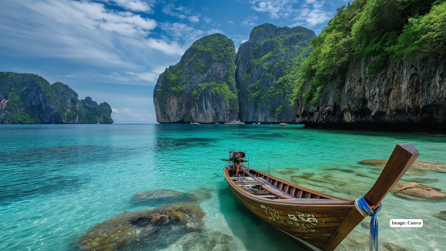 Maya Bay, Phi Phi Islands - Thailand Maya Bay is enclosed by the huge limestone cliffs, and the water in the lagoon of the bay has a beautiful blue colour that draws tourists to snorkel and dive into the water. It still has its unspoiled beauty and movie appeal in spite of restrictions on visitors. (Image: Canva)