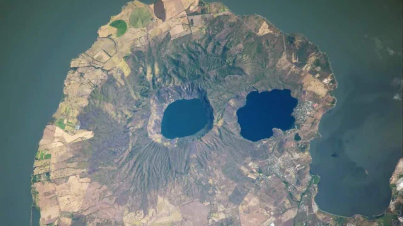 Earth from Space: Eerie volcanic ‘googly eyes’ peer from skull-shaped Peninsula into the sky