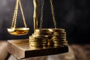 Gold hits record high as traders bet on US rate cuts, eye Powell's signal