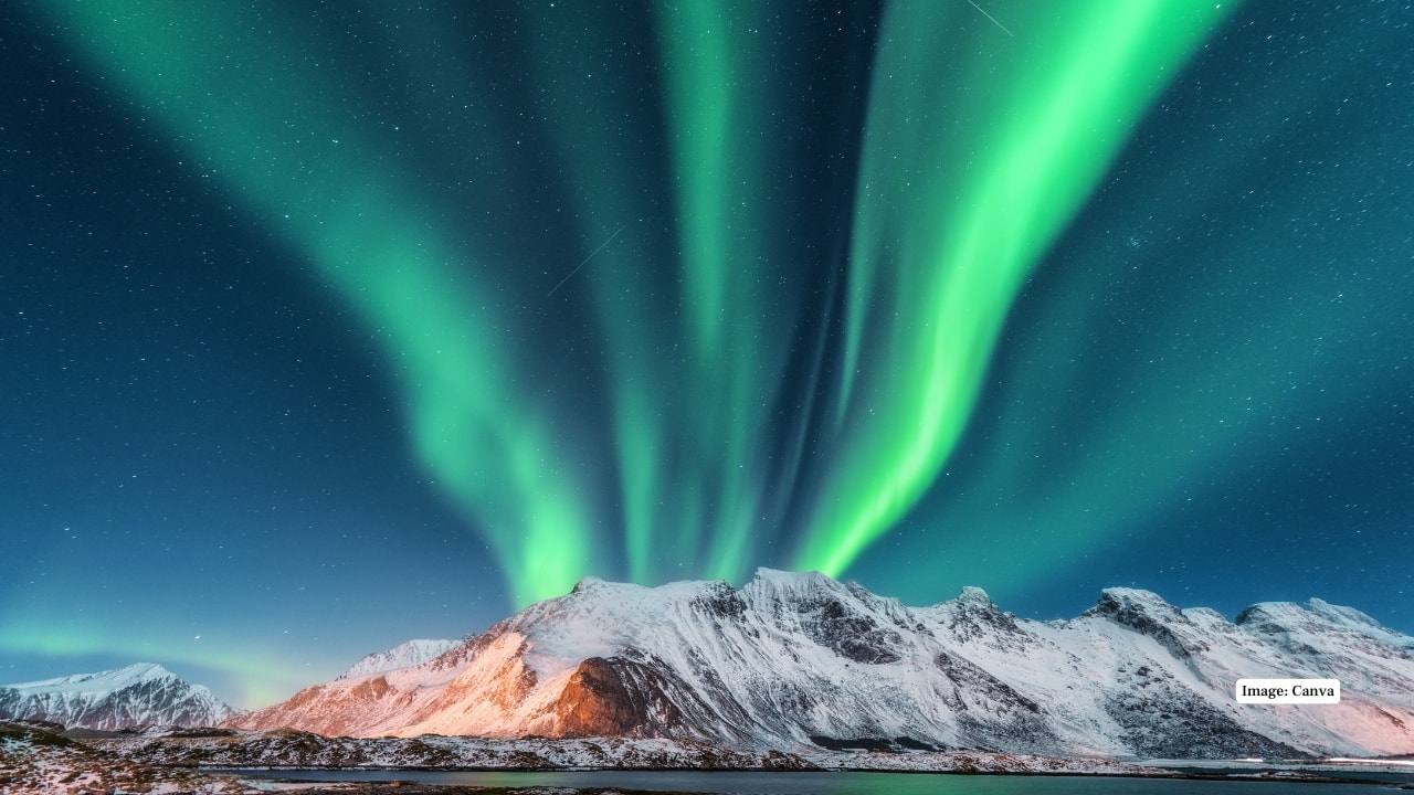 2. Polar Regions, Northern Lights Aurora borealis comes in the form of a curtain of colour in the sky at night. It is matched with the movement of greens, purples and reds which give an illusion of moving waves, thus giving the sky a life and magic. (Image: Canva)