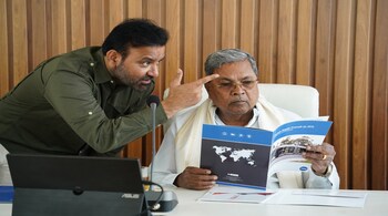 CM Siddaramaiah with labour minister Santosh Lad