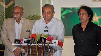 Chairman of Pakistan Cricket Board, Mohsin Naqvi, center, speaks as former cricket board heads Najam Sethi, left, and Ramiz Raja watch during a press conference regarding the Asia Cup tournament, in Lahore, Pakistan. (AP Photo)