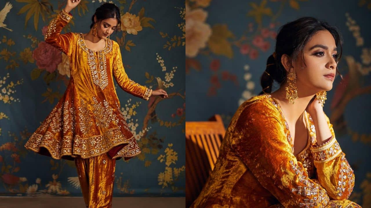 Vibrant orange bliss Keerthy Suresh looked beautiful in a velvet full-sleeve kurti with an umbrella-like shape and paired with a Punjabi-style pajamas. She styled her hair in a braid with a decorative thread and paired it with gold jewelry.