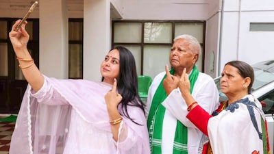 Rohini Acharya with Lalu Yadav (File Photo)