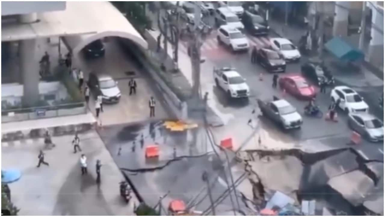 Massive sinkhole opens in Bangkok amid Typhoon Ragasa, swallows cars and electricity poles. Watch Massive sinkhole opens in Bangkok amid Typhoon Ragasa, swallows cars and electricity poles. Watch