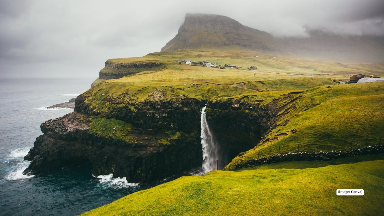 2. Faroe Islands, Denmark Halfway between Iceland and Norway, the Faroe Islands look like something out of a Norse saga. Turf-roofed cottages perch on emerald cliffs, seabirds sweep across dramatic fjords, and waterfalls tumble straight into the sea. It’s raw, moody, and wildly photogenic—a perfect escape for those who crave solitude in nature. What to explore: Mulafossur Waterfall, the village of Gásadalur, puffin-spotting, and hiking across windswept cliffs. 2. Faroe Islands, Denmark Halfway between Iceland and Norway, the Faroe Islands look like something out of a Norse saga. Turf-roofed cottages perch on emerald cliffs, seabirds sweep across dramatic fjords, and waterfalls tumble straight into the sea. It’s raw, moody, and wildly photogenic—a perfect escape for those who crave solitude in nature. What to explore: Mulafossur Waterfall, the village of Gásadalur, puffin-spotting, and hiking across windswept cliffs.