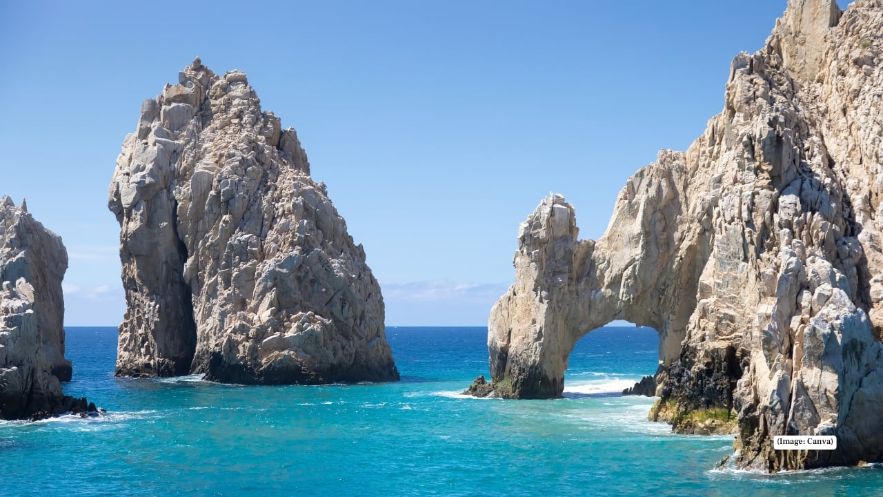 5. Playa del Amor, Mexico – Hidden Crystal Beach Playa del Amor, or Lover’s Beach, near Cabo San Lucas, is a secluded paradise surrounded by dramatic cliffs and crystal-clear waters. Accessible only by boat, it offers soft sandy shores, vibrant marine life for snorkeling, and stunning views where the Pacific Ocean meets the Sea of Cortez, creating a magical, surreal escape.