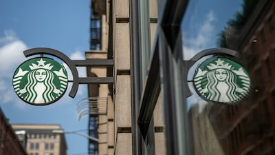 Starbucks to close stores, cut jobs in $1 billion restructuring