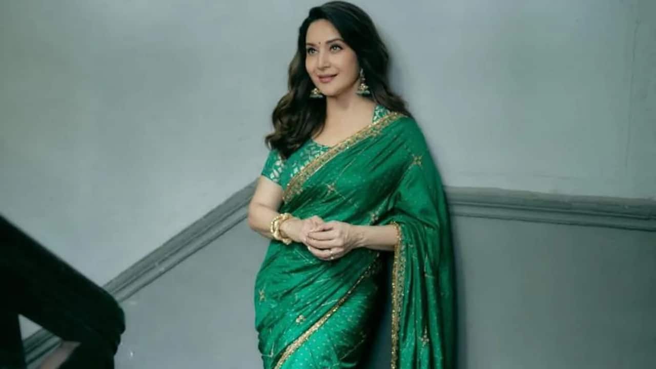 Loose curls and neat buns add sophistication to each look effortlessly. Her hairstyles bring versatility, suitable for both puja and festive gatherings.