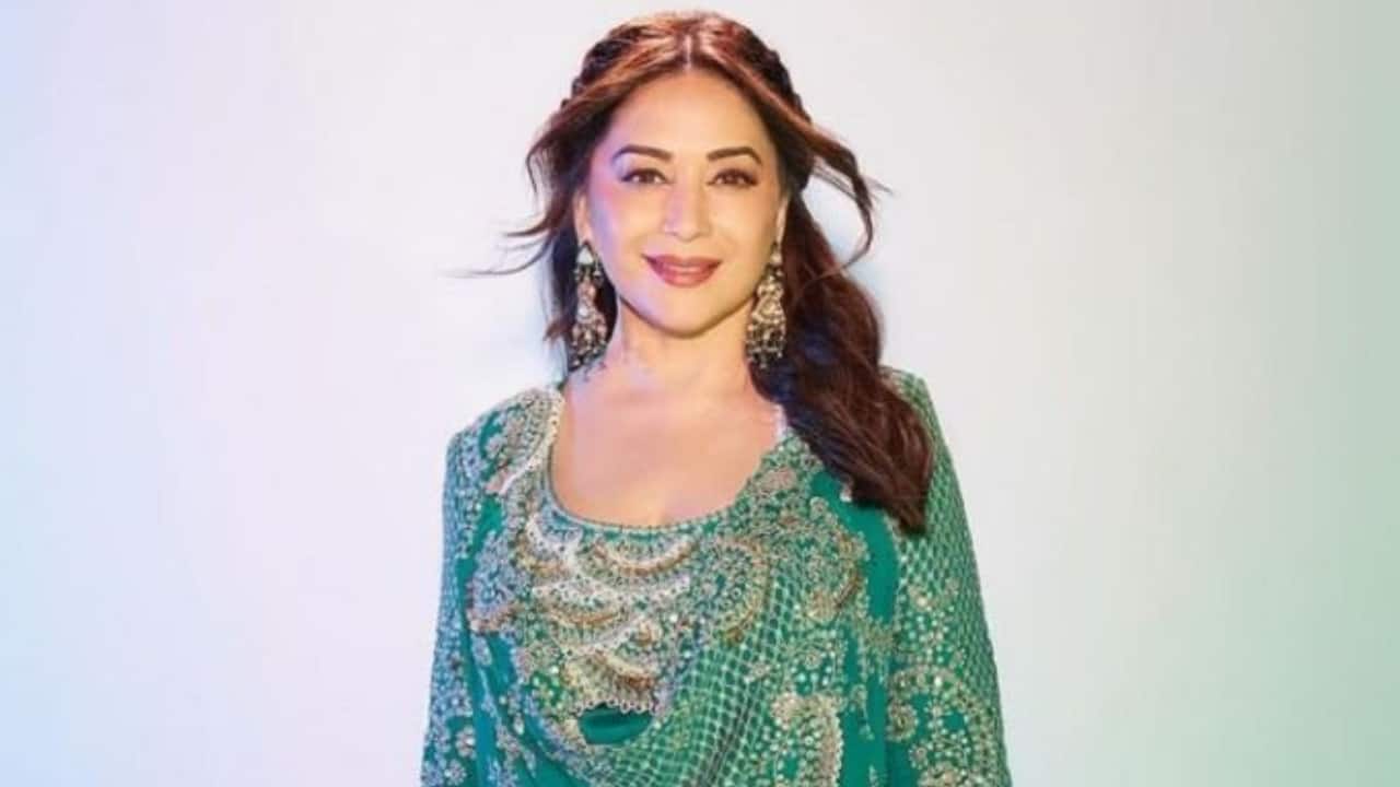 Green brings out her radiant energy, matching the vibrancy of the festival.