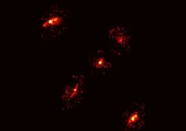 'It shouldn’t exist': Scientists stunned as rare 'Einstein cross' reveals mysterious fifth light