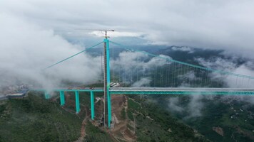 World's Tallest: China’s Huajiang Grand Canyon ‘Earth’s crack’ bridge cuts travel from 2 hours to 2 minutes