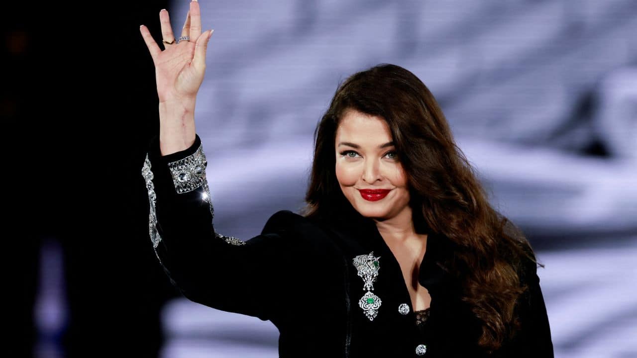 Reimagined sherwani look Aishwarya looked stunning in a bold and sophisticated reimagined sherwani look. The stunning custom-made Indian sherwani in indigo reimagines traditional clothing through an &quot;androgynous couture lens.&quot;