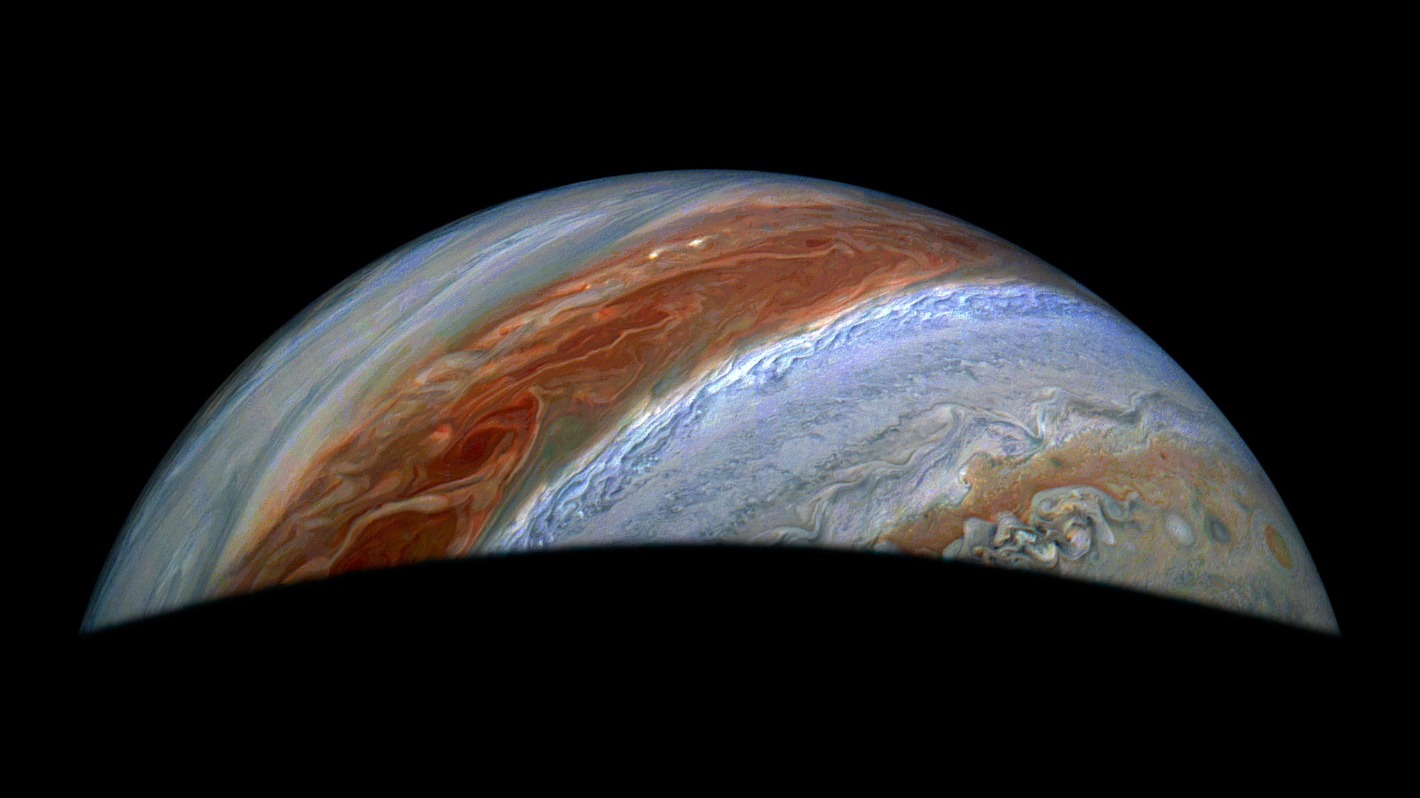 Juno spacecraft photographs Jupiter’s chaotic atmosphere, unveiling incredible cloud patterns