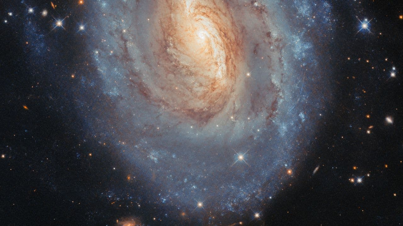 2. NGC 6000: The spiral galaxy NGC 6000 features a glowing yellow core surrounded by sparkling blue outer regions. (Image: X/@HUBBLE_space)