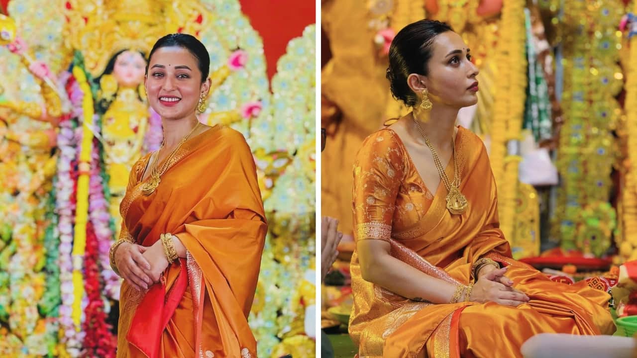 All-Gold Glam Mimi Chakraborty went all out on shine by styling her bright orange saree with all-gold jewellery. Her intricately designed necklace, earrings, and bangles complemented her gracefully draped festive look. Gold is evergreen, and Mimi proves it with her ensemble.(Image: Instagram)