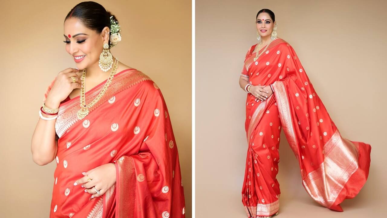 Polki Charm Polki never fails to impress with its timeless charm. Bipasha Basu shows how not just chokers but also long necklaces and statement earrings can give your saree look an extra edge. Her styling with a bindi, red and white bangles, and a floral-decorated bun makes her a true-blue Bengali beauty.(Image: Instagram)