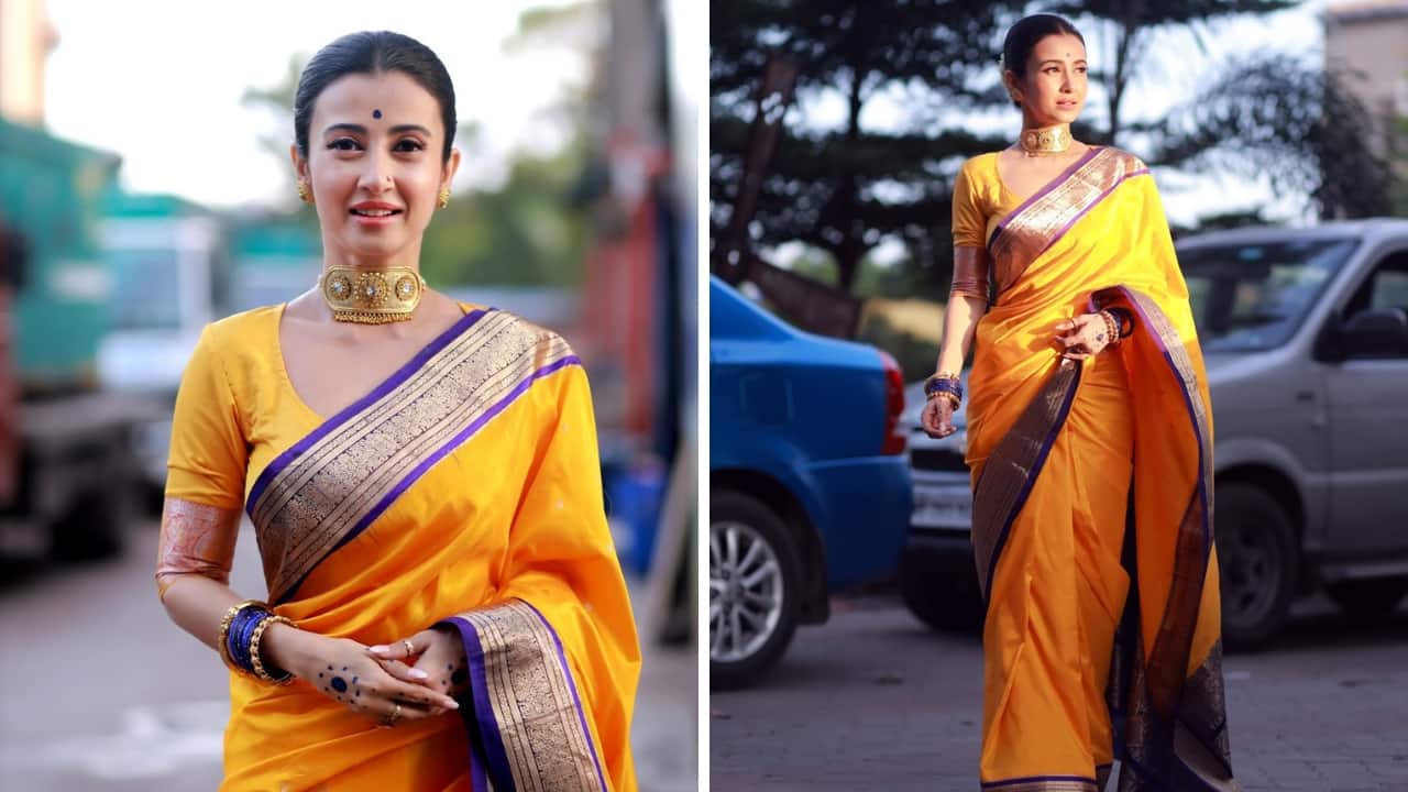 Purple and Gold Glam Monami Ghosh demonstrates how to style a solid gold choker with her sunshine yellow saree featuring a purple border. She matched her jewellery perfectly with her drape by wearing purple bangles along with gold kadhas.(Image: Instagram)