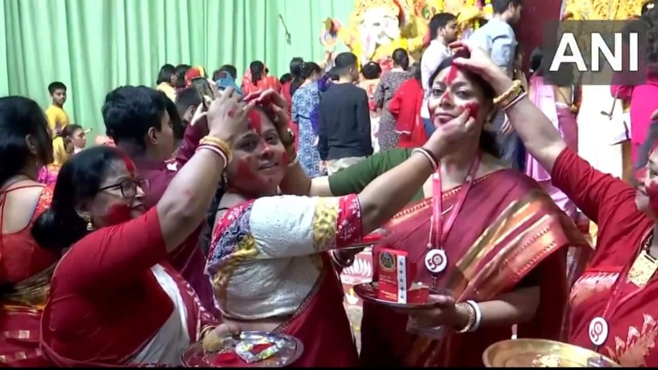 Sindur Khela, or “the game of vermilion,” involves married women applying sindoor on the goddess and then on each other, praying for prosperity, long life for their husbands, and protection for children. (Photo: X)