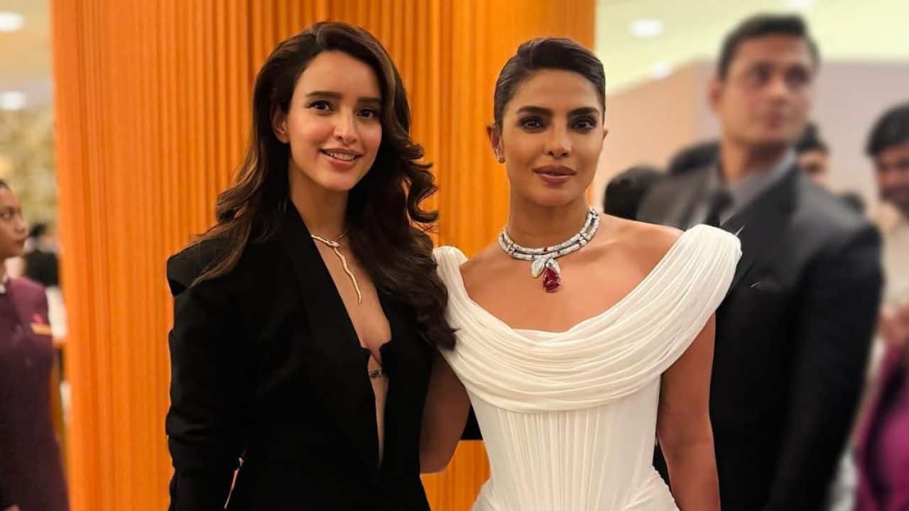 A stylish duo The actress was seen posing with the Bollywood actress Triptii Dimri at the event. Triptii’s look beautifully contrasted with Priyanka’s looks in a black blazer and a shimmering neckpiece. The two-actresses posed against an orange backdrop showcasing a high-fashion glamour.