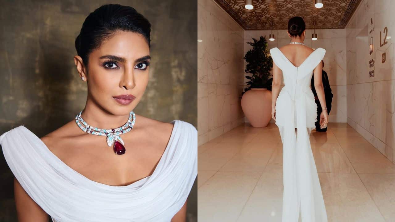 The Bvlgari glamour The image offers two different views of the actress’s look from the event. The close-up look highlights her smoky eye makeup and the stunning necklace. The second image offers a view of her dress from the backside. The rear view shows a detail of the white off shoulder dress as the actress walks away.