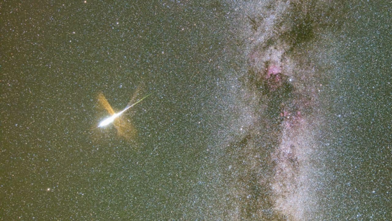 Milky Way and Exploding Meteor: The Perseid meteor shower, born from Comet Swift-Tuttle’s debris, will soon dazzle night skies, with bright streaks visible despite moonlight softening the celestial show. (Image: NASA)