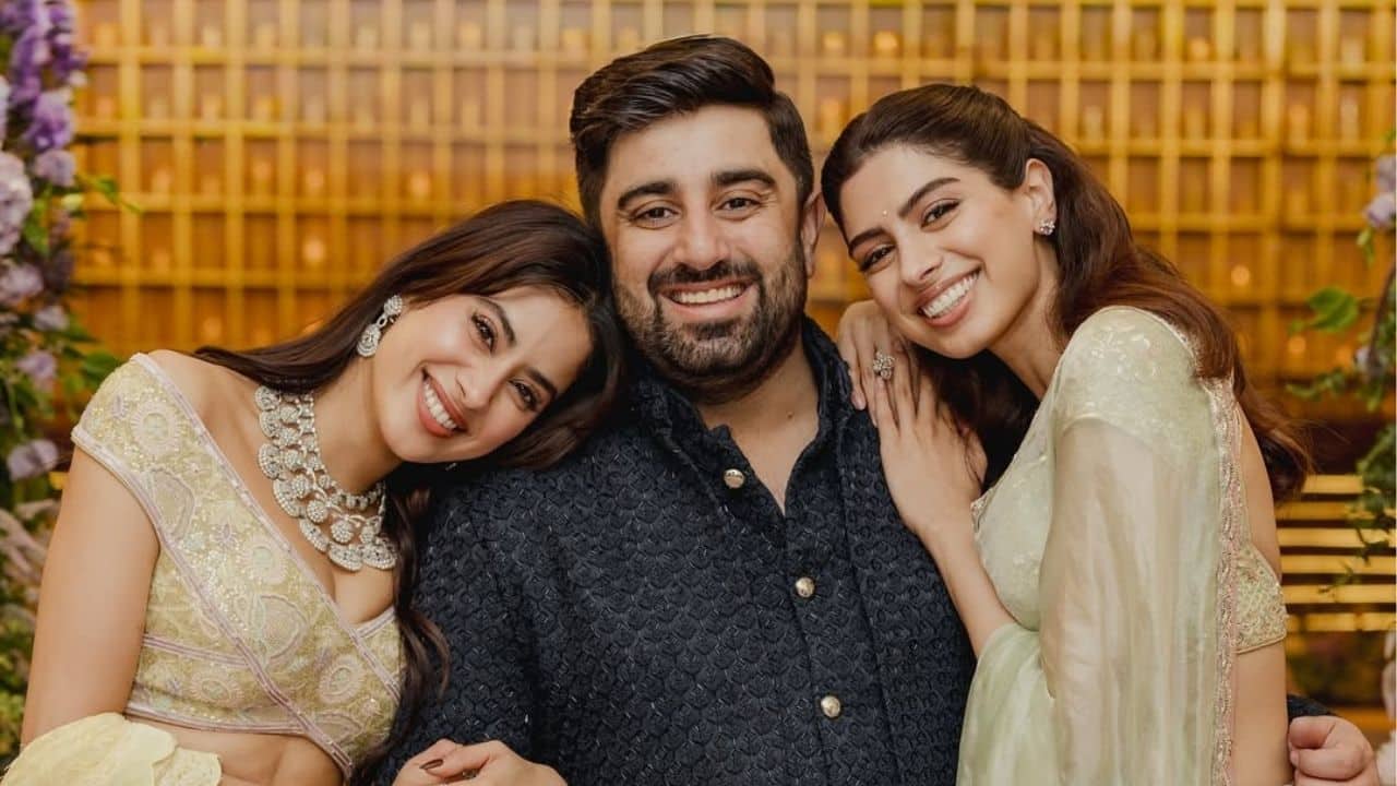 Rohan and the Kapoor sisters, Janhvi and Khushi, share a cute moment as they cuddle up to him. The trio's radiant smiles convey their close relationship and the excitement of the moment.