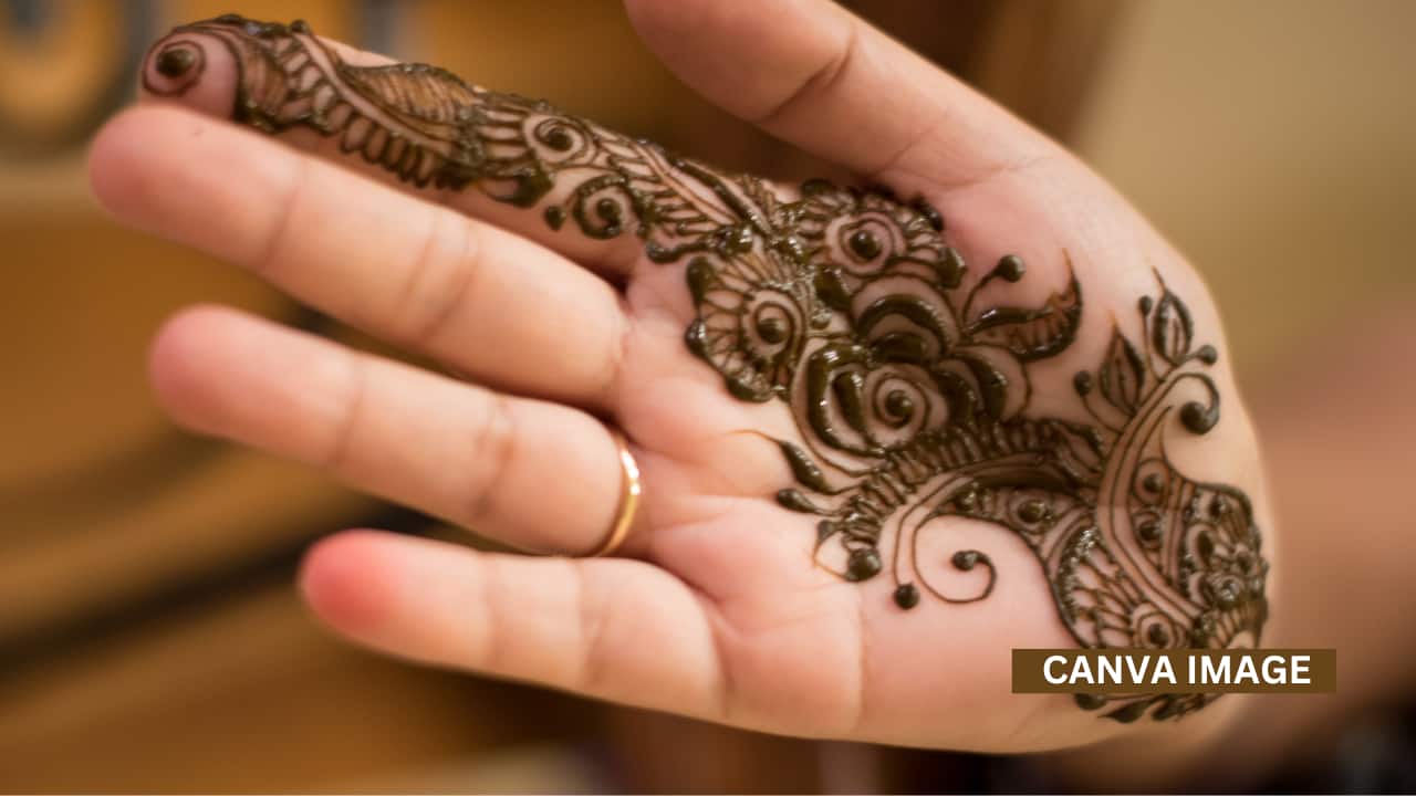 Applying mehndi is a sacred ritual before Karwa Chauth, adding grace and positivity to the festival’s celebration. Applying mehndi is a sacred ritual before Karwa Chauth, adding grace and positivity to the festival’s celebration.