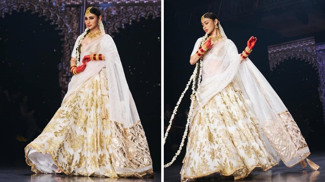 Mouni Roy stuns in a white and gold lehenga styled with alta and gajra
