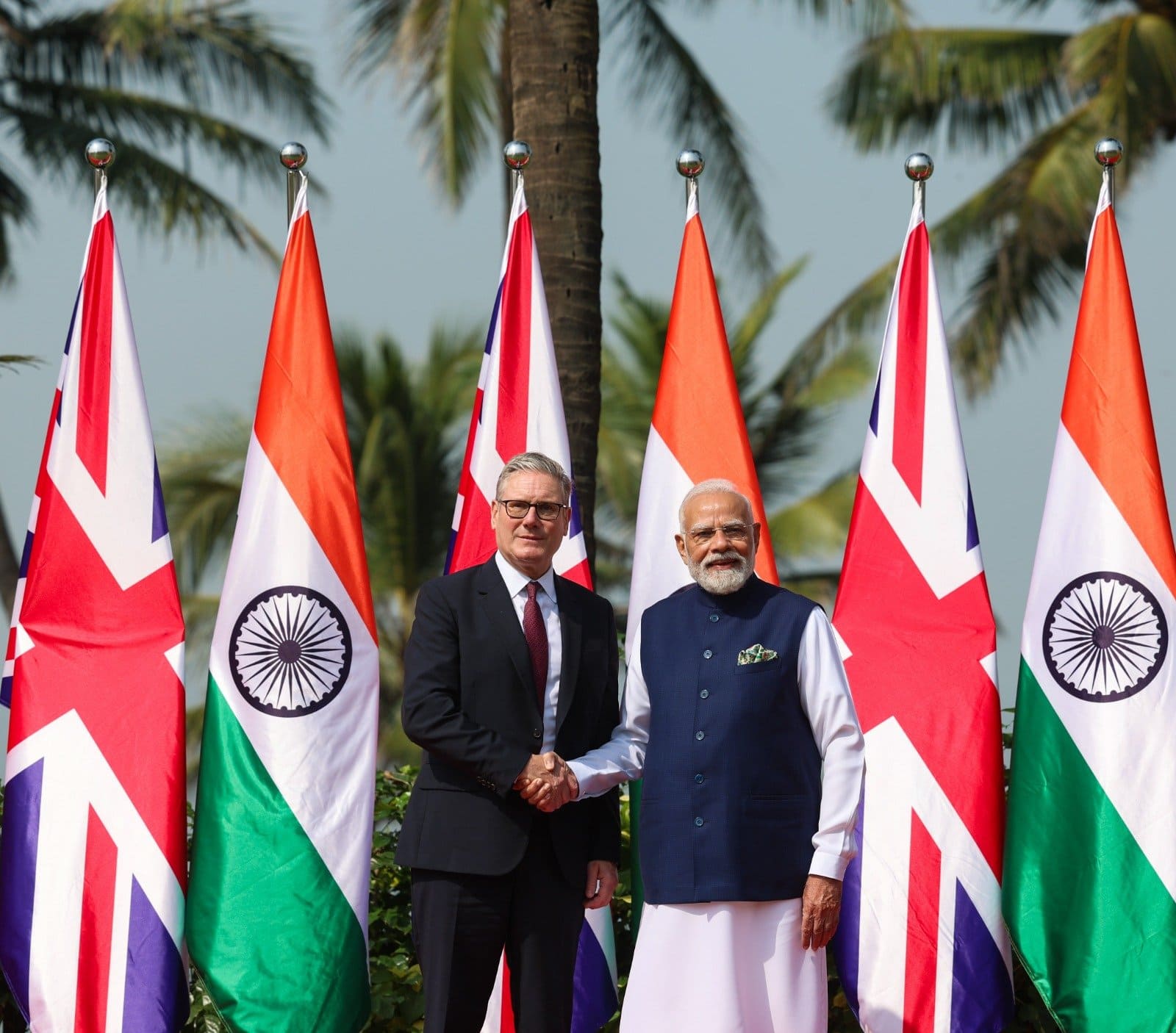 Modi and Starmer posed for photographs against a striking backdrop, the Indian and British flags fluttering together in the sea breeze, symbolising the renewed warmth and shared purpose in India–UK relations.