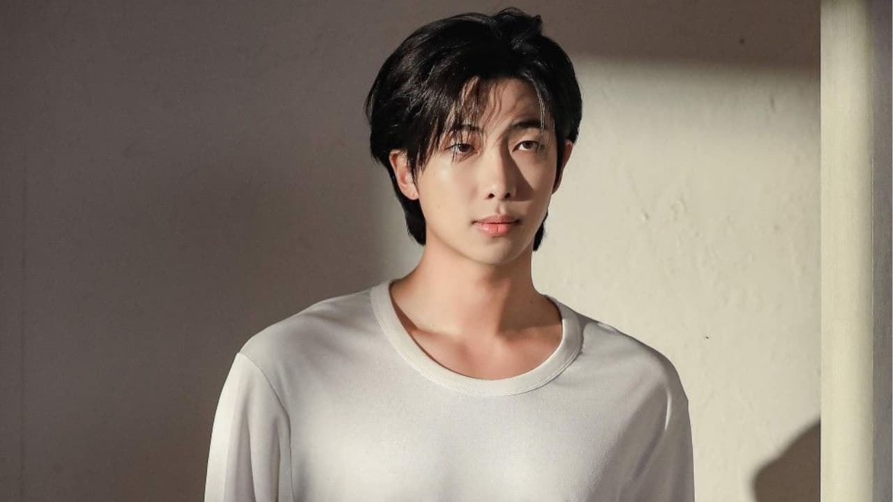 RM (Kim Namjoon) Born in: Dongjak-gu, Seoul Grew up in: Ilsan, Goyang Born in Seoul’s Dongjak-gu but raised in Ilsan, Goyang, Kim Namjoon grew up surrounded by lakes, trees, and silence — the kind that lets thoughts breathe. “Ilsan gave me time to think,” he once shared. And you can tell. His lyrics sound like conversations with himself, written after long walks in the park. Maybe that’s why RM’s the balance BTS always needed — the calm between all that noise.