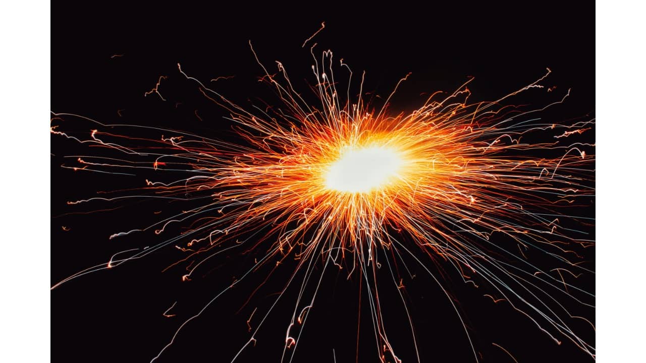 Diwali rangoli celebration  Produce a realistic 4K scene of a family making a colourful rangoli together. Parents and two children are seated on the floor in bright traditional attire. Rangoli patterns are intricate and surrounded by small diyas. The background shows festive decorations and warm lighting, capturing smiles, laughter, and the excitement of children. Faces should match the originals.