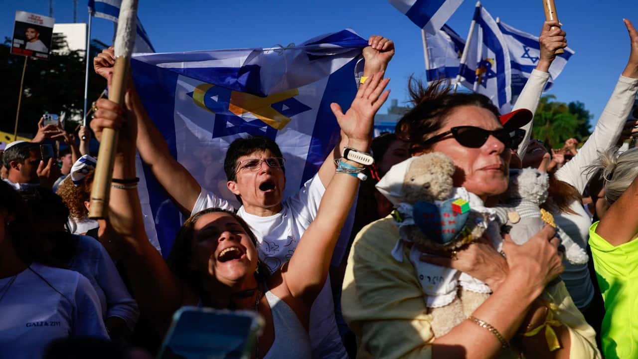 People celebrate at Hostage Square in Tel Aviv as news came out that Hamas has already handed over seven surviving hostages to the Red Cross. While the hostages’ release marks a significant humanitarian milestone, key issues remain unresolved, including Gaza’s governance, Hamas’ future role, disarmament concerns, and the financing and management of a multi-billion-dollar reconstruction effort, leaving the region’s political and security landscape fragile.