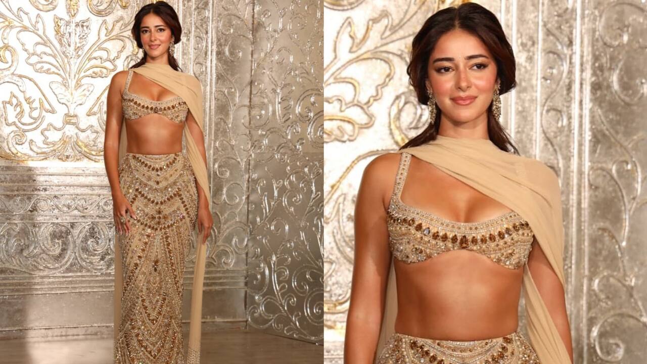 Ananya Panday Ananya Panday looked stunning in an exquisite gold lehenga set with a low-cut bralette-style blouse. She completed her look with a sheer dupatta draped over her shoulder, adding a touch of softness to the bold, glittering attire.