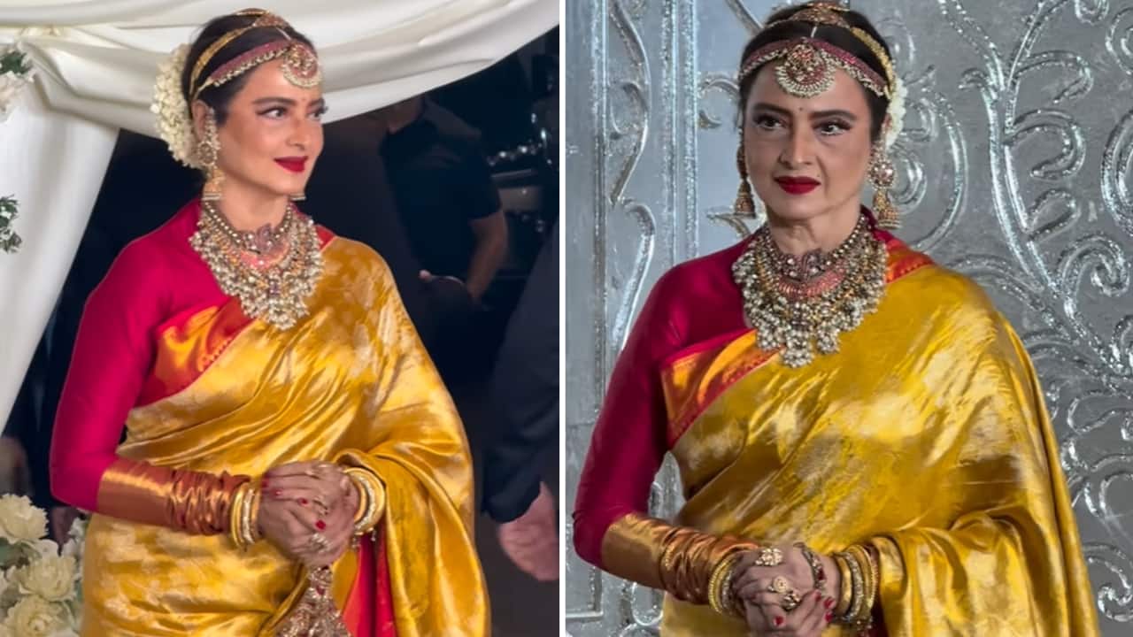 Rekha Veteran actress Rekha stole the spotlight with her golden-yellow silk saree, pairing it with a long-sleeved, bright red blouse. She elevated her magnificent traditional look with heavy necklaces and a matching headpiece. She completed her look with a traditional bun adorned with white flowers (gajra).