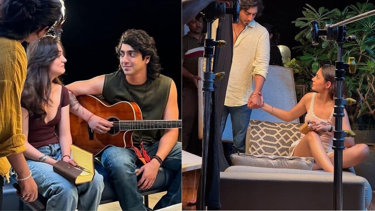 Ahaan Panday and Aneet Padda are shown in these behind-the-scenes photos from Saiyaara at their most relaxed, playful, and perfectly in sync. The same spark that illuminated the screen is captured in one frame as Ahaan strums a guitar and Aneet watches in silent admiration. In another, despite the commotion of the movie set, they spend a tender moment hand in hand, engrossed in conversation, in between takes.