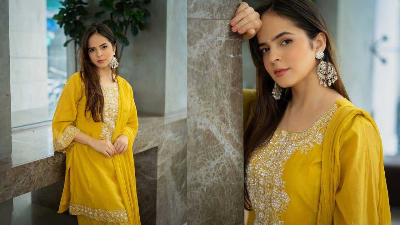 Palak Sindhwani In a British yellow salwar suit with a white printed neckline and the same carried on the border of the sleeves and the end of her kurti, she looks pretty. Palak has paired beautiful chandbalis and has kept her look classic. 