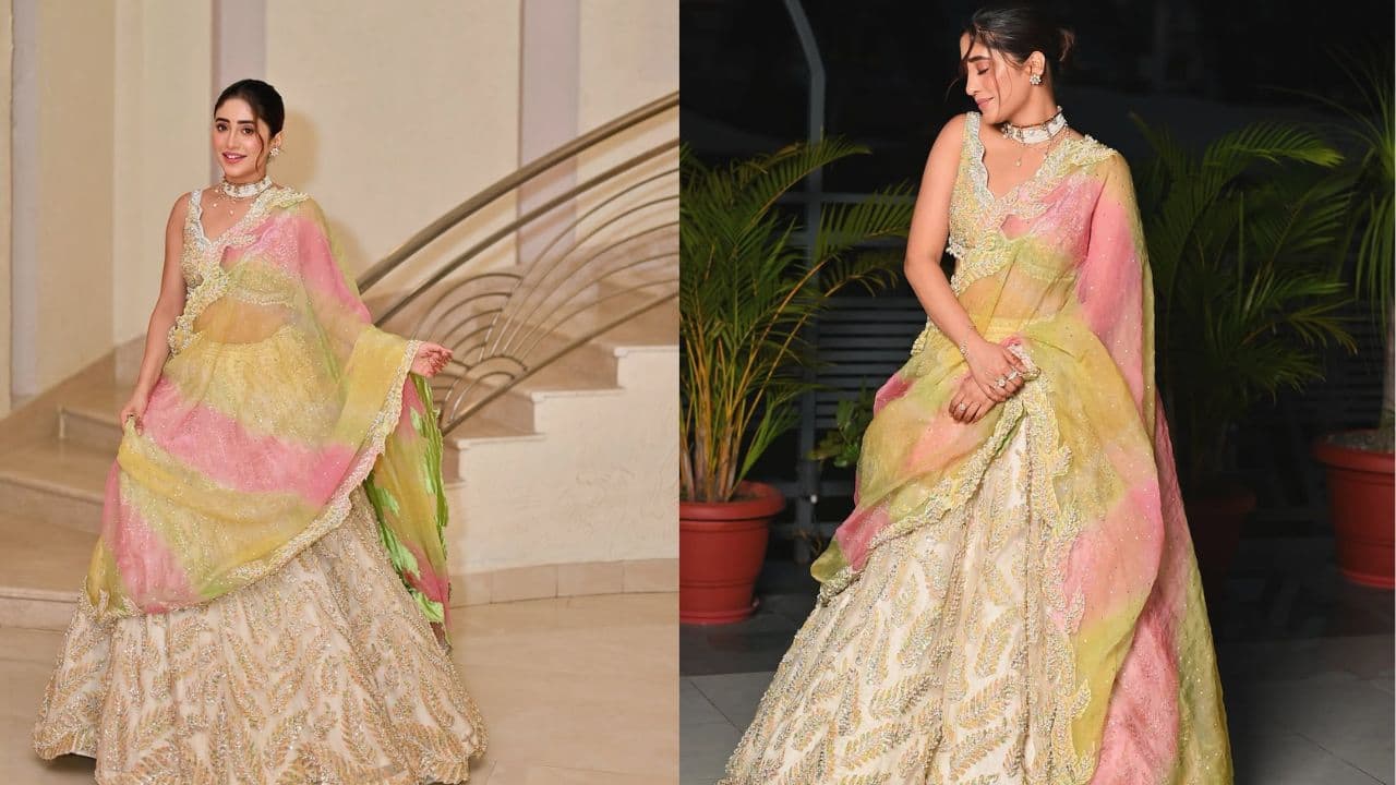 Shivangi Joshi She looks pretty in the pastel coloured lehenga choli and it is a perfect wear if you want to keep your look subtle and sophisticated yet fancy and festive. Tie your hair into a bun and accessorize your look with a pearl choker to take your fashion game a notch higher.